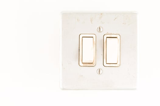 Light switch on white photo