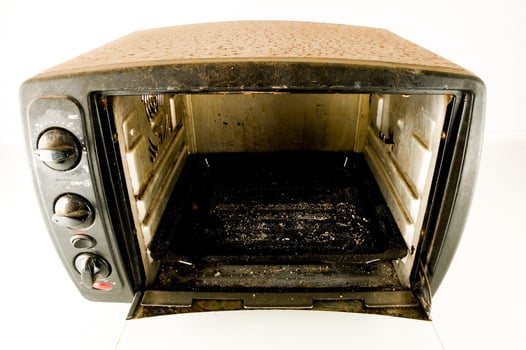 Old microwaves on white photo