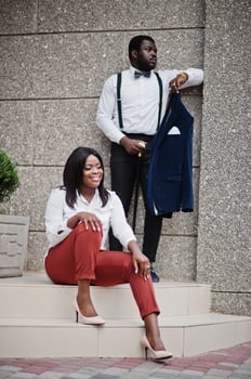 Stylish african american couple in formal wear. Romantic couple in love dating. photo