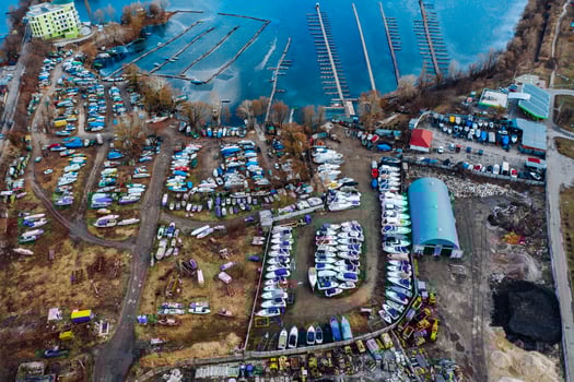 Aerial view of boat yard on land. Stored ships during winter time photo