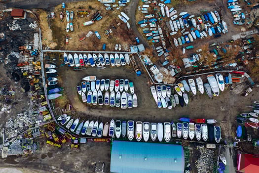 Aerial view of boat yard on land. Stored ships during winter time photo