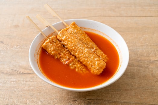 Omuk - Korean fish cake skewer in Korean spicy soup photo