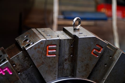 Eye-bolts for turret lathes in electric vehicle parts manufacturing plants,engineering concept photo