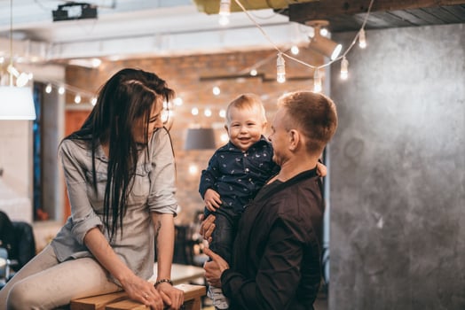 Mom dad and little son spend time together photo