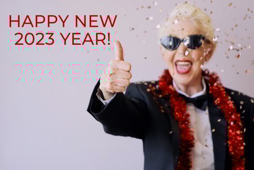 Beautiful stylish mature senior woman in sunglasses and tuxedo celebrating new year. Fun, party, style, celebration concept photo