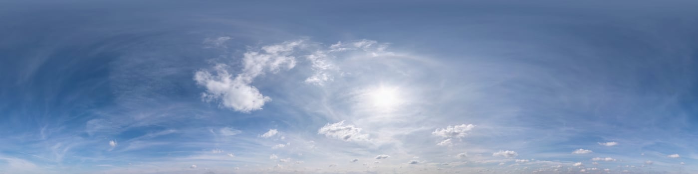 Seamless cloudy blue sky hdri panorama 360 degrees angle view with beautiful clouds  with zenith for use in 3d graphics or game as sky dome or edit drone shot photo