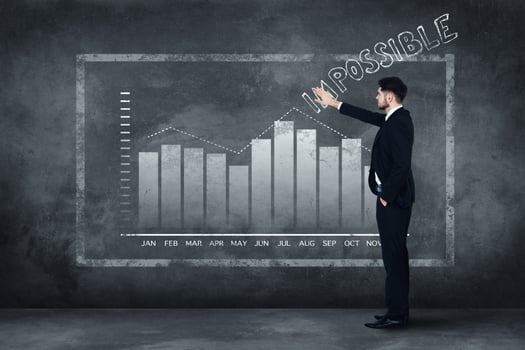 Everything is possible. Full length of confident young man in full suit standing near concrete wall and touching illustrated chart photo
