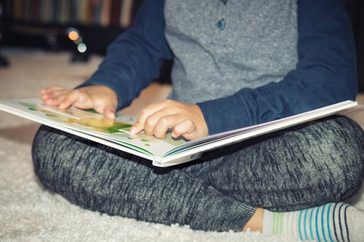 Child reading a book. photo