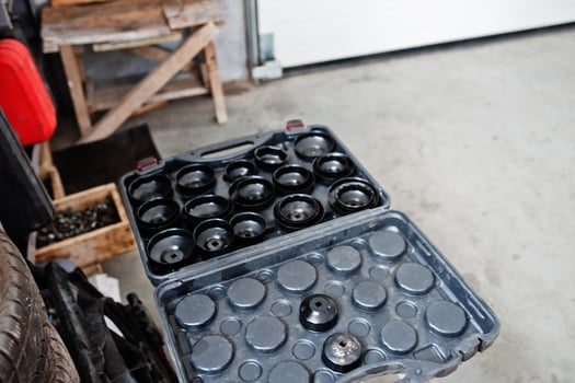 Car repair and maintenance theme. Filters of motor oill in auto service. photo
