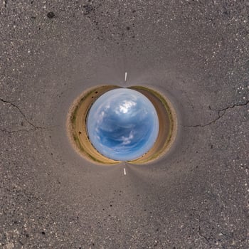 Blue little planet. Inversion of tiny planet transformation of spherical panorama 360 degrees. Spherical abstract aerial view. Curvature of space. photo