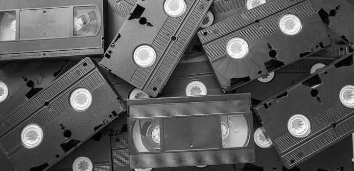 Messy stack of VHS tapes. Video Home System tape cassettes. photo