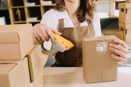 Portrait of Starting small businesses SME owners, two Asian woman check online orders Selling products working with boxs freelance work at home office, sme business online small medium enterprise photo
