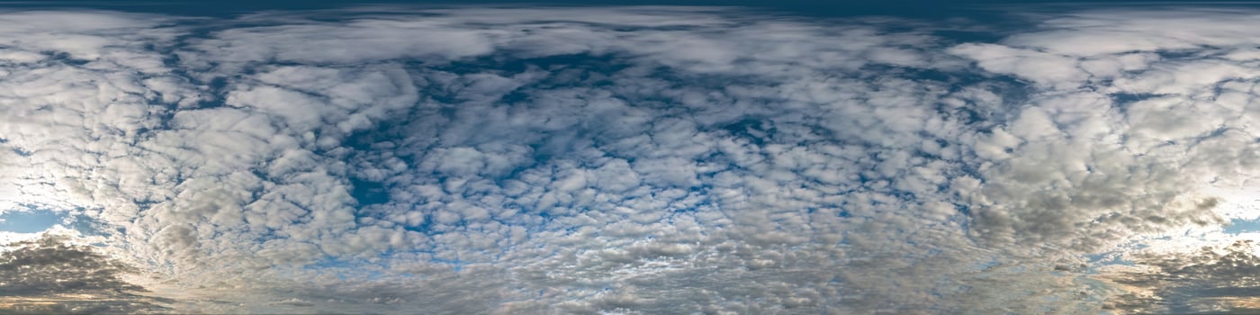 blue sky with beautiful cumulus clouds. Seamless hdri panorama 360 degrees angle view with zenith for use in 3d graphics or game development as sky dome or edit drone shot photo