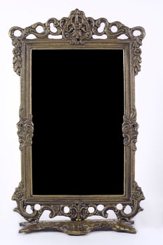 Antique blank photo frame with black interior