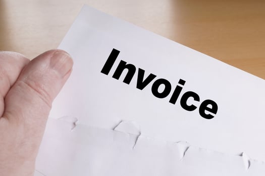 hand holding invoice letter photo
