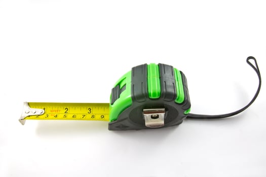 Single green and black tape measure photo