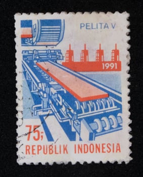 Sidoarjo, Jawa timur, Indonesia, 2022 - Stamp collection philately with factory illustration theme photo
