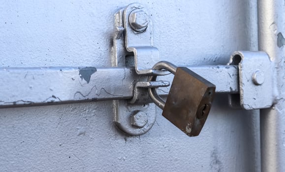 Silver colored industrial Intermodal Shipping Container Door Lock Mechanism for Security During Shipping photo