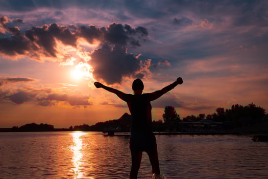 Feeling free at summer sunset photo