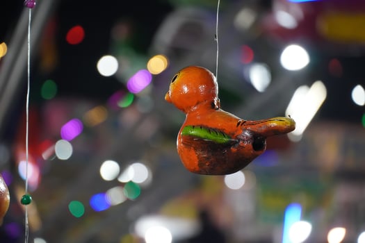 wooden toy hanging on rope hd. photo