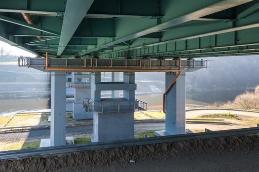 huge car bridge across the wide river photo