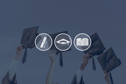 Graduation Close-up of four hands holding mortar boards against sky background photo