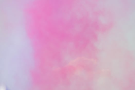 close up of colorful red smoke in the sky. Abstract background photo