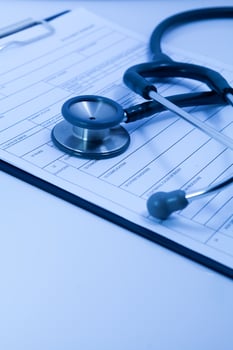 stethoscope on blank Patient information photo