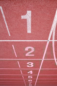 Numbers on running track photo