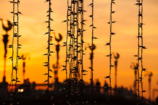 festive small lamps in evening background photo