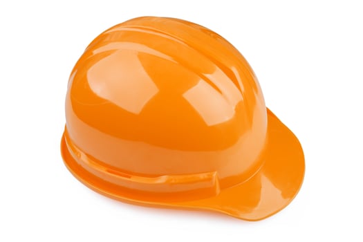 orange safety helmet on white background photo