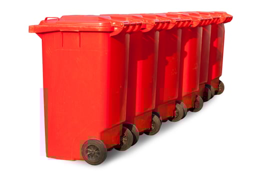 Red large trash cans on white background photo