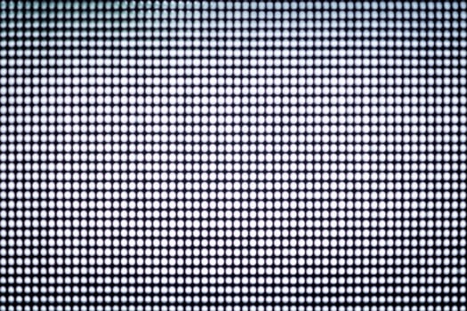 Abstract blurred black wall with tiny small holes. photo