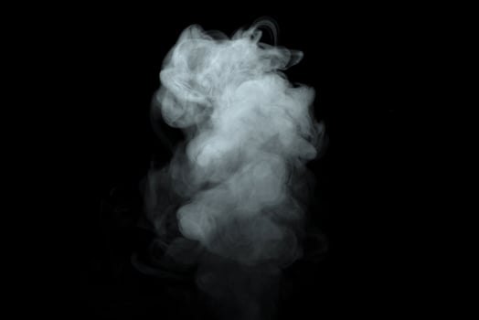 Abstract powder or smoke isolated on black background photo
