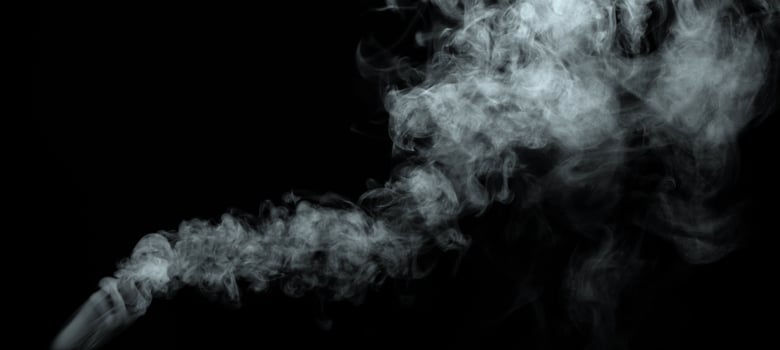 Abstract powder or smoke isolated on black background photo
