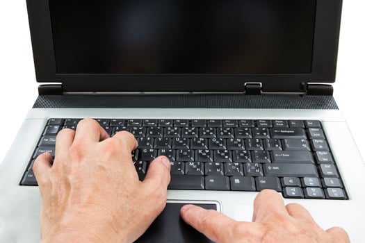 closeup man using laptop photo