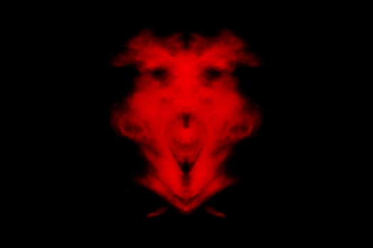 Textured cloud, Abstract red,isolated on black background photo