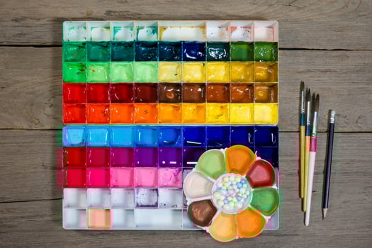 closeup paint tray on wood background photo