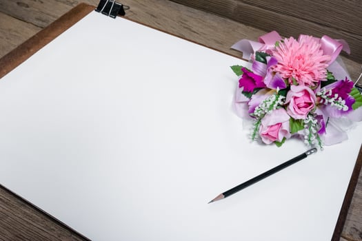 drawing board with paper on desk photo