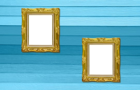 twain antique golden picture frame on wood texture photo