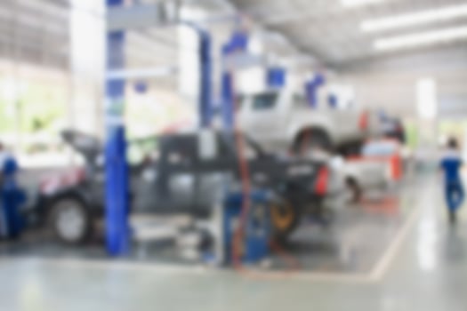 car repair service center blurred background photo