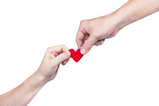hand holding heart-shaped isolated over white,clipping path photo