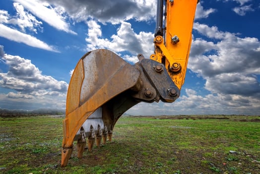Industrial background. Digger bucket close-up. Construction excavator bucket. photo