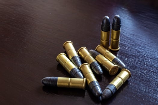Bullets on the table. Ammunition. Concept of crime photo