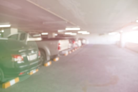 Car parking lot interior blur background with Lens Flare of Illustration,Abstract Blurred photo