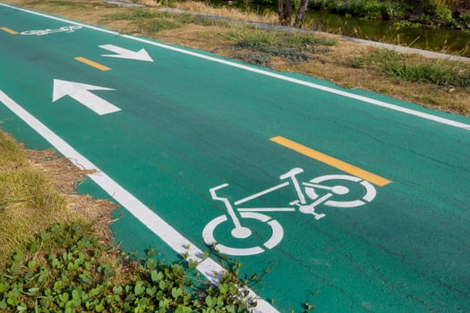 Bicycle symbol on city street photo
