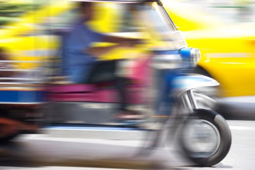 Tuk tuk taxi  Motion blurred background photo
