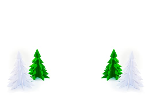 origami christmas tree isolated on white background photo