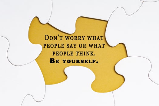 Motivational quote on jigsaw puzzle with some missing pieces. photo