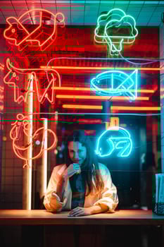 Beautiful girl in a window cafe photo